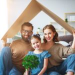 new-family under a cardboard roof in their home_s