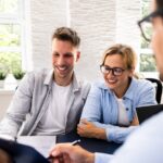 Two happy people reviewing a trust_s