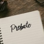 gavel,glasses,pen and notebook with word Probate_s