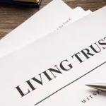 Living trust papers with pen and book_s